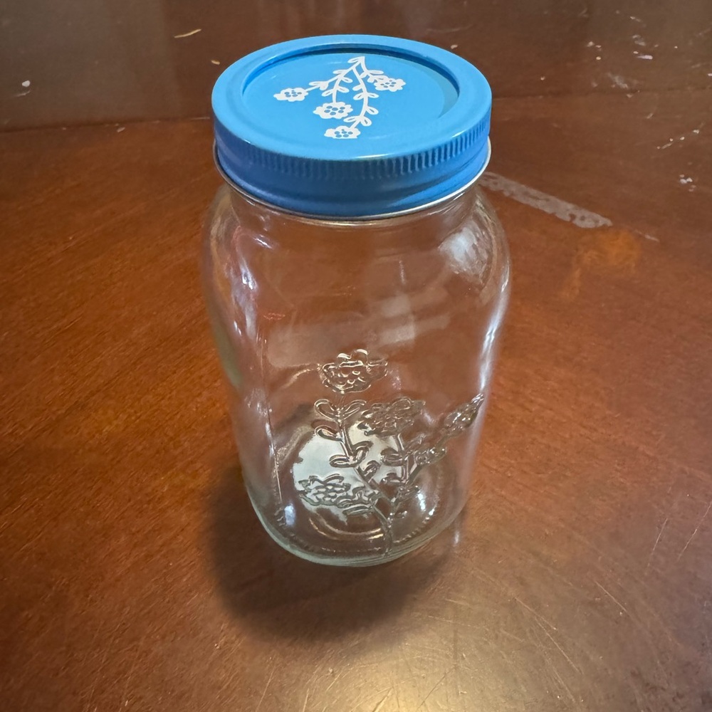 Glass Jar with Blue Lid and Floral Design